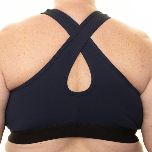 Back view of navy high-impact plus size sports bra from Gym Stuff Plus showing supportive cross straps.