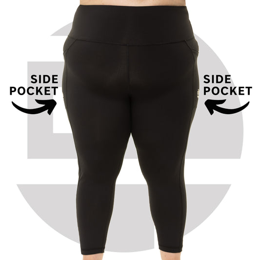 Plus size woman wearing black high waist squat proof leggings from Gym Stuff Plus, supportive fit with pockets.