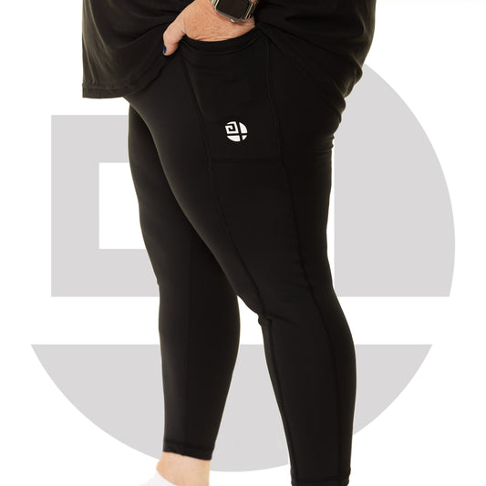 Side view of black plus size high waist leggings from Gym Stuff Plus showing pocket detail and flattering fit.