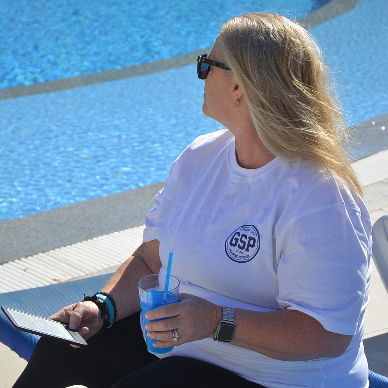 plus size white off duty t-shirt women sitting by pool gsp logo